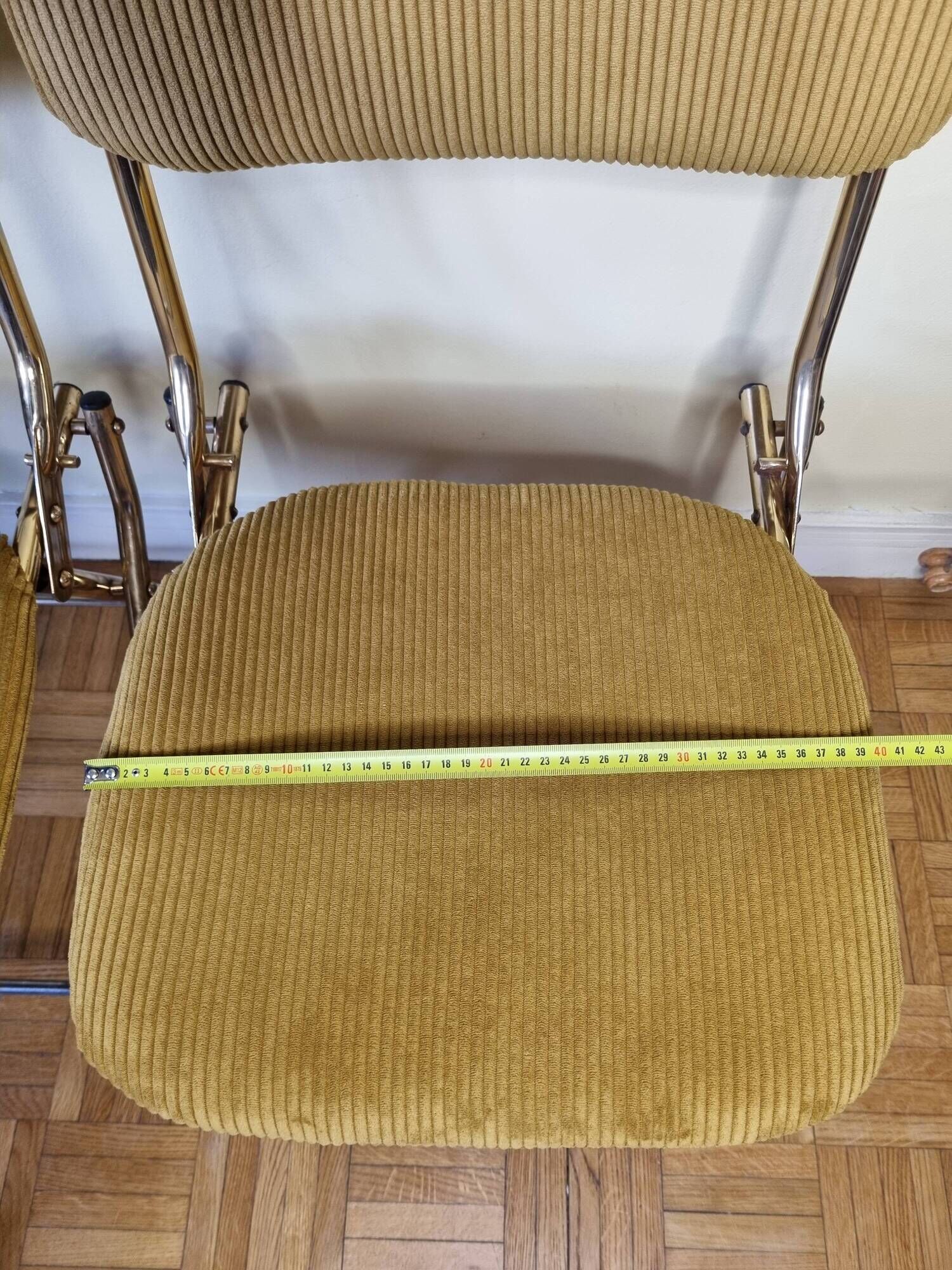 Pair of vintage folding chairs in gilded metal and 70s fabrics, restored