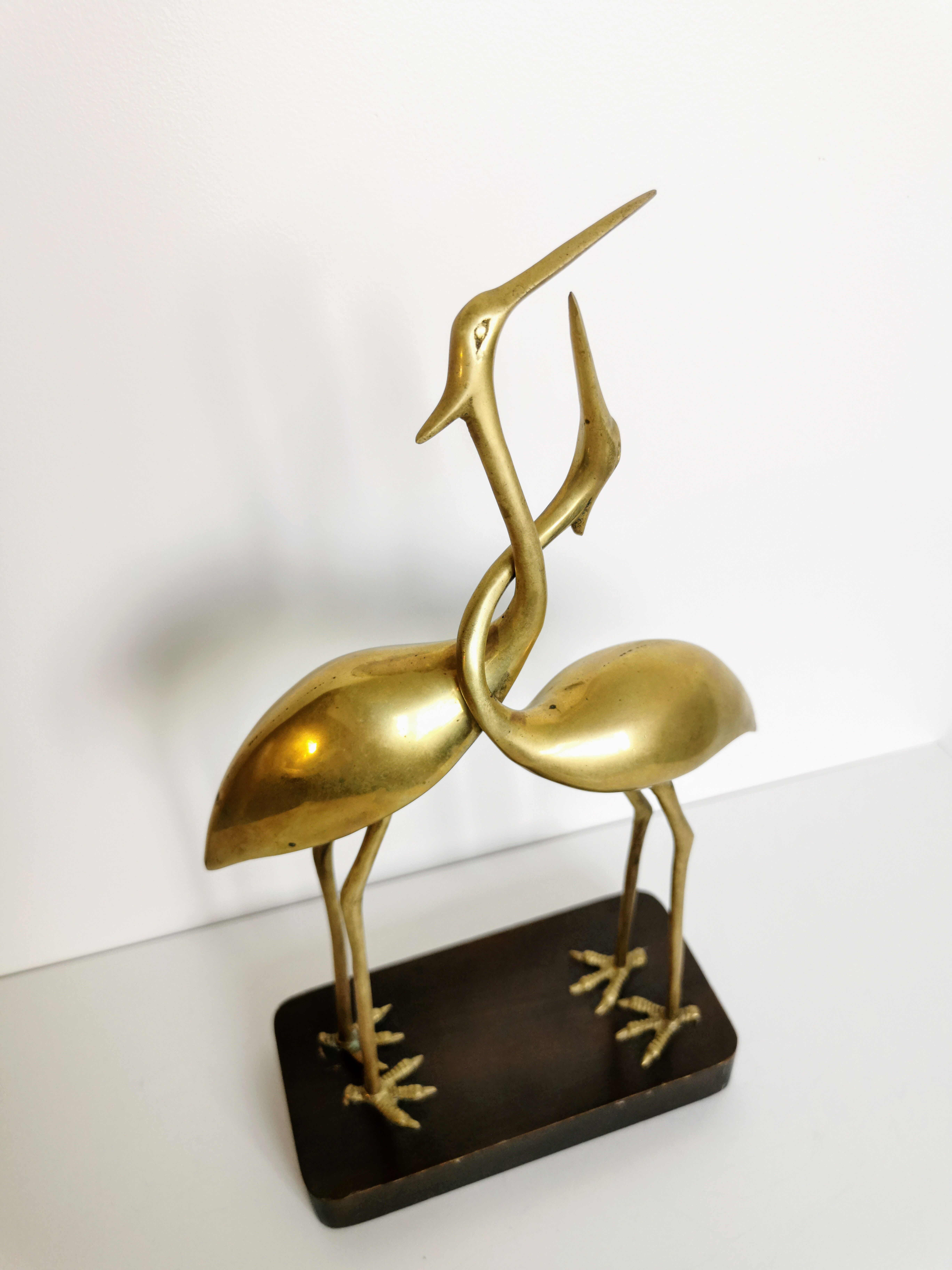 Couple of brass herons