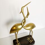 Couple of brass herons