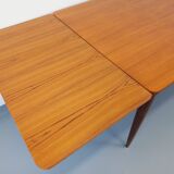 Vintage Scandinavian style rectangular dining table from the 50s 60s in teak with extensions