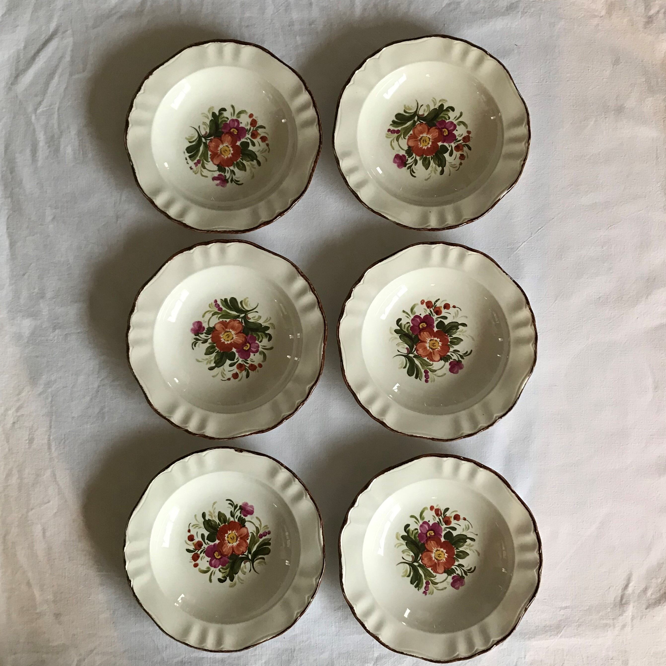 Series of 6 hollow porcelain plates
