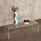 Vintage coffee table in curved transparent plexiglass – 70s/80s
