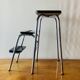 Tabouret escabeau vintage en formica noir et acier chromé