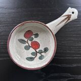 Frying pan with red fruit decoration