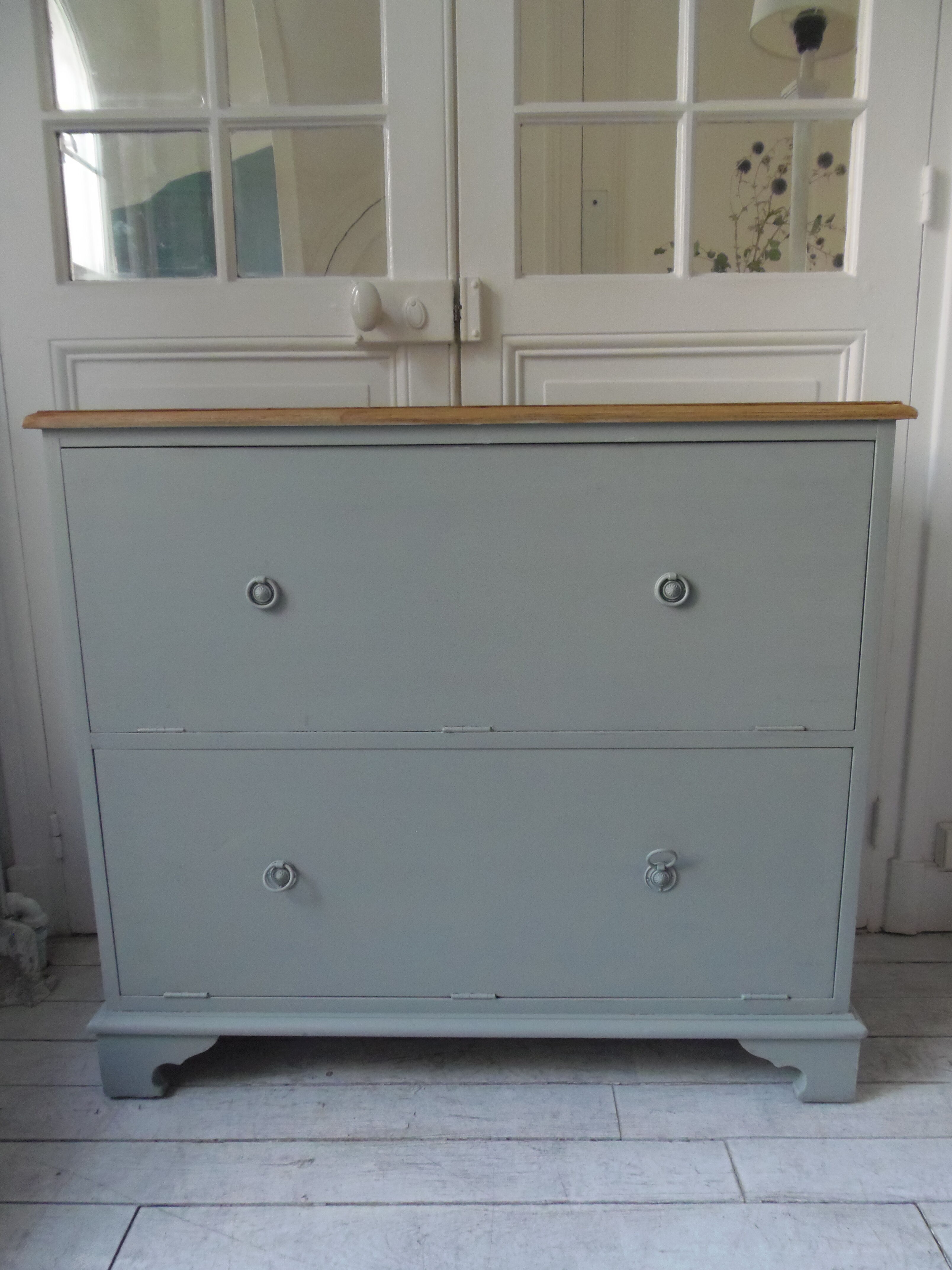 Vintage shoe cabinet green of gray, wooden top.