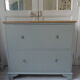 Vintage shoe cabinet green of gray, wooden top.