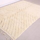 Moroccan handwoven wool rug, 250x150 cm, traditional style.