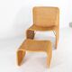 Wicker accent chair and its ottoman