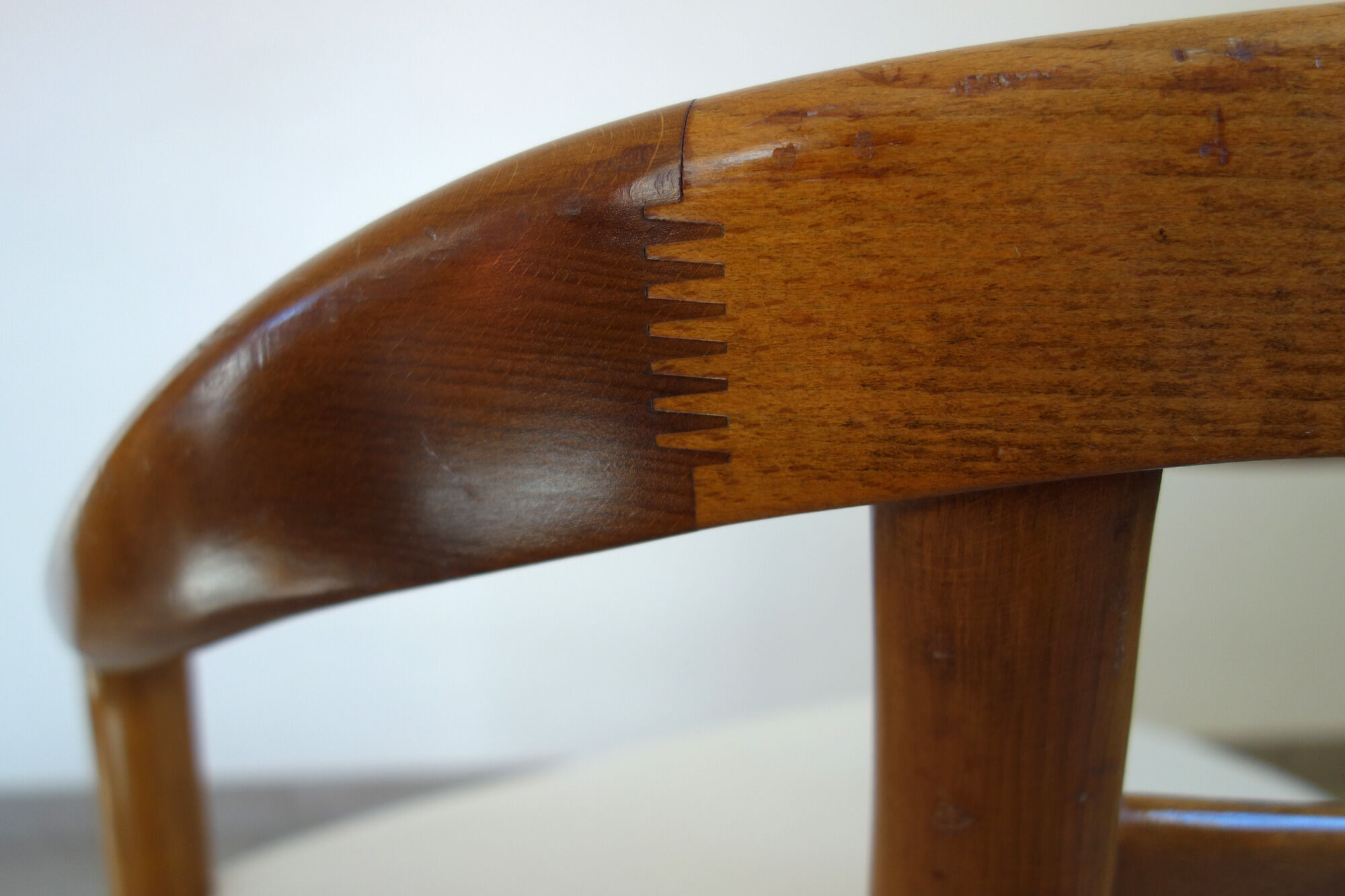 Vintage wooden armchair and thin buckle