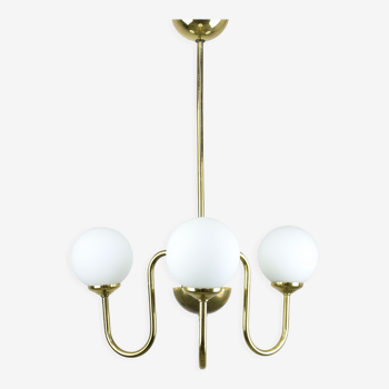 Vintage golden chandelier in opaline glass