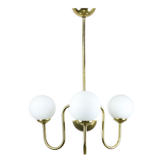 Vintage golden chandelier in opaline glass