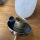 Paire d'appliques dorées et globe moucheté années 50