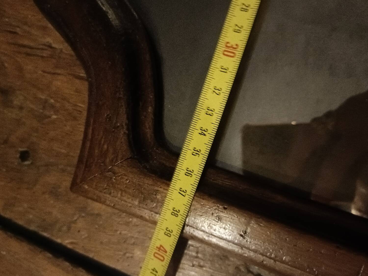 Antique shaped mirror, wood and bronze