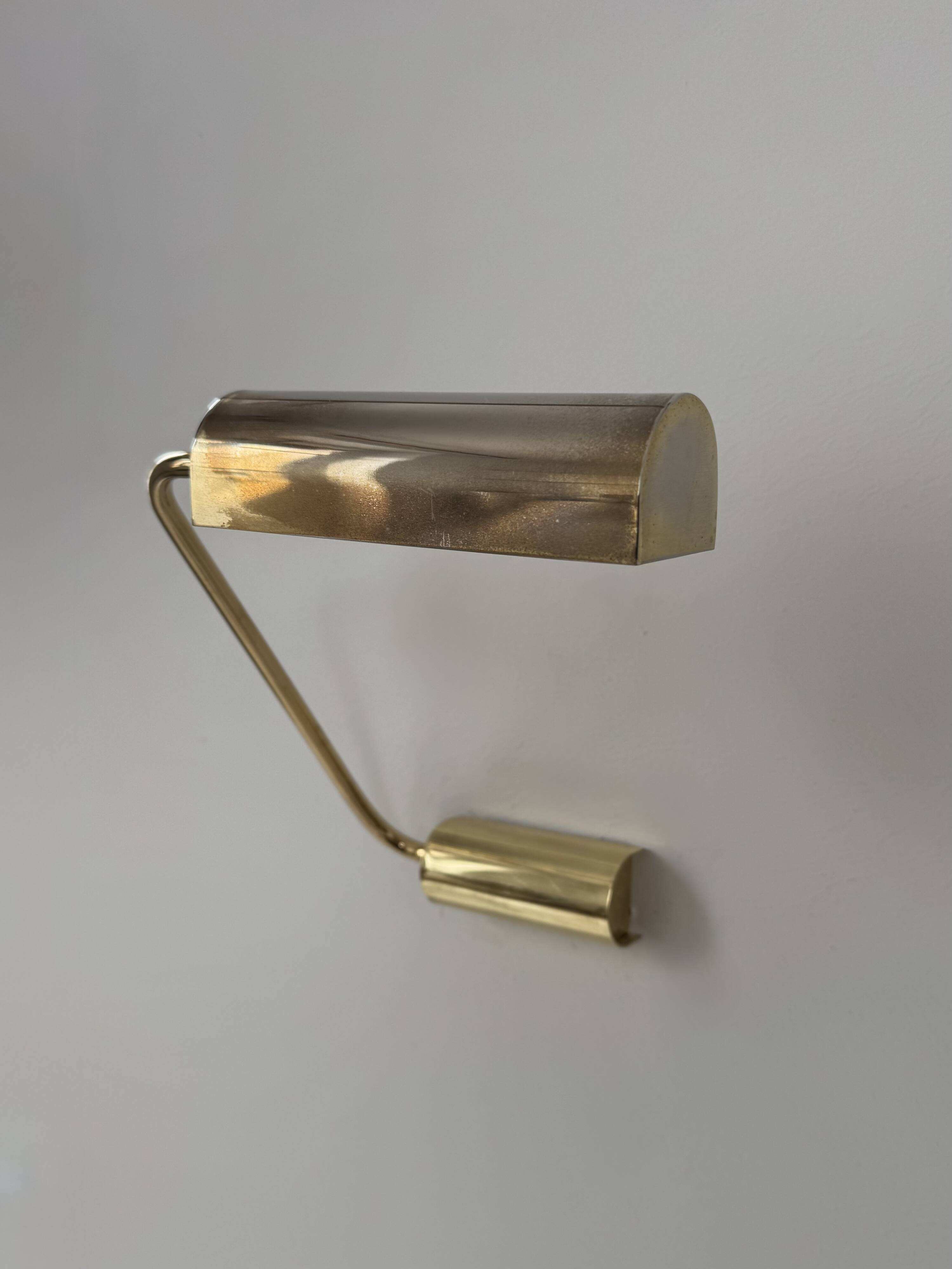 Vintage adjustable brass wall light, France, 1970.