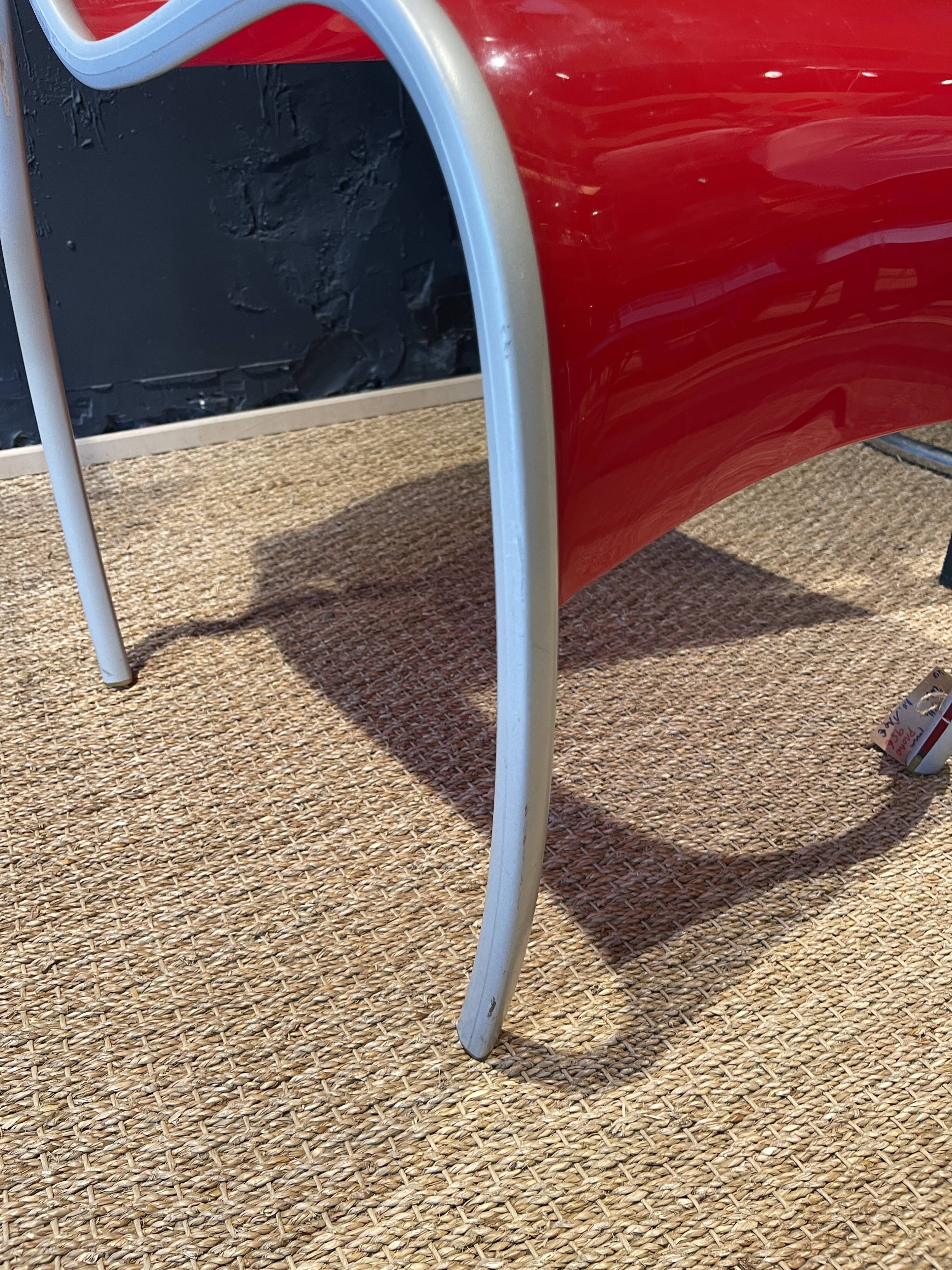 Pair of FPE chairs by Ron Arad for Kartell translucent and red Italy