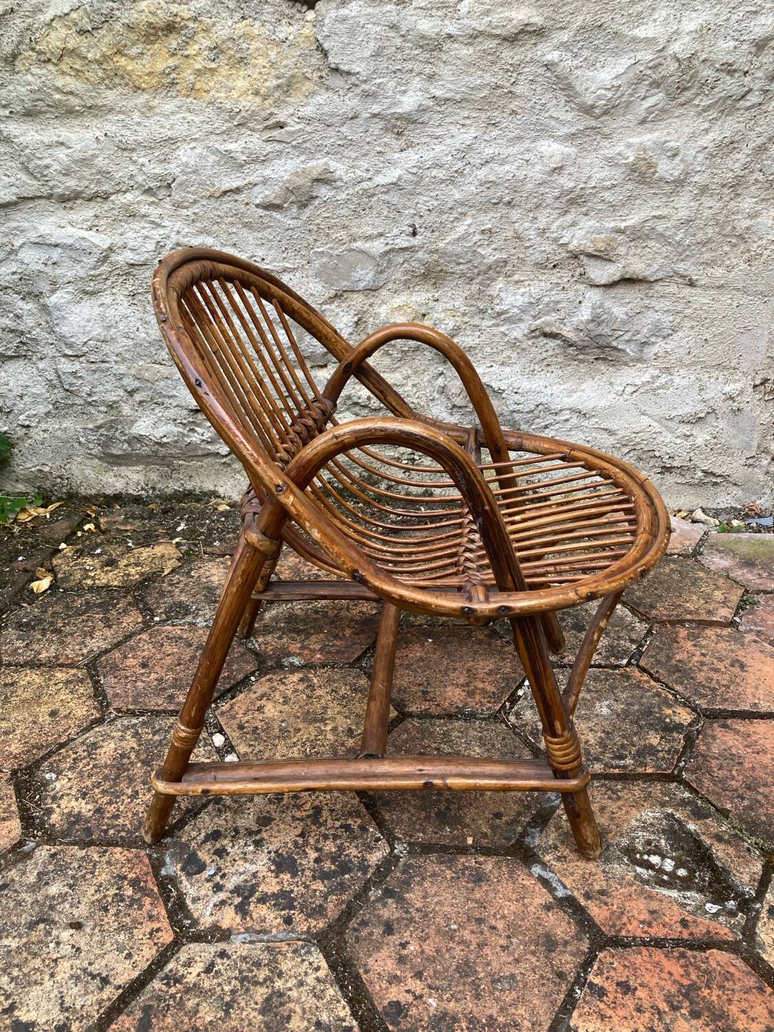 Vintage rattan children's armchair