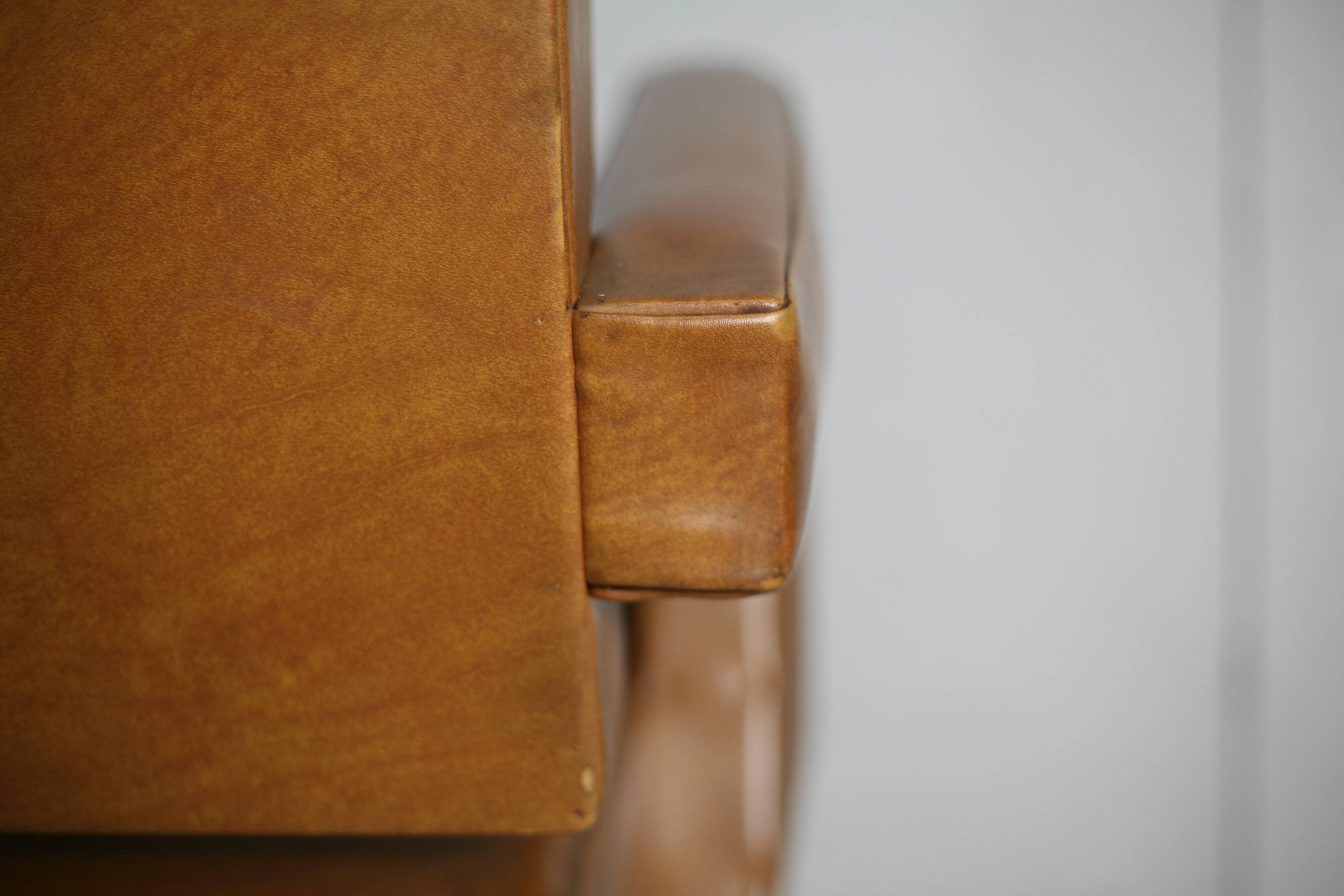 Armchair Jacques Adnet, style circa 1955