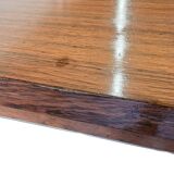 Vintage wooden dining table with chrome frame.