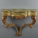 19th-century carved wooden drop-leaf console.
