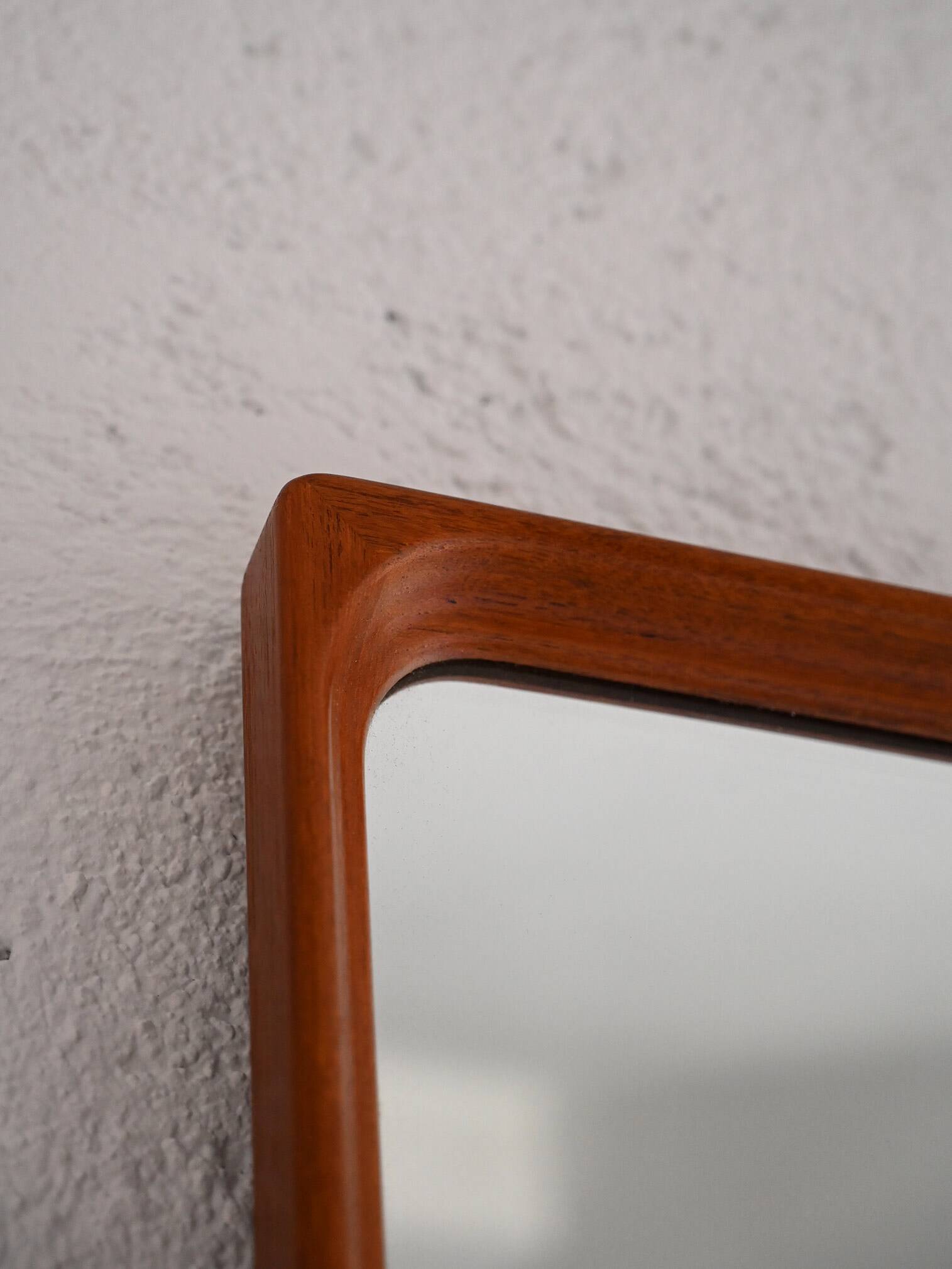 Vintage half-bust mirror with wooden frame