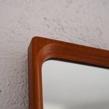 Vintage half-bust mirror with wooden frame