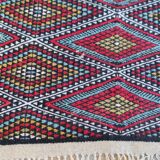 Handmade multicolored diamond patterned kilim rug in natural wool