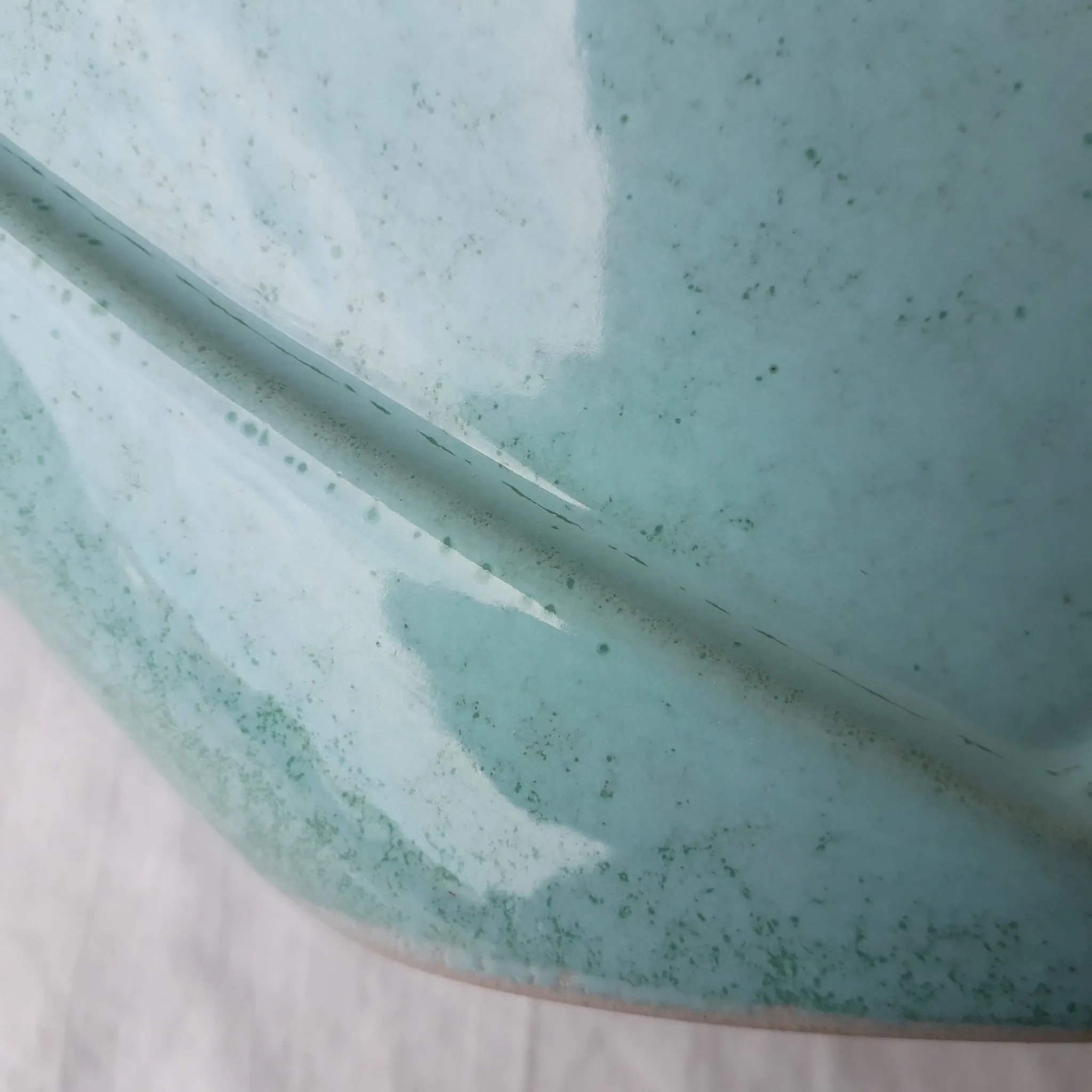 Turquoise ceramic vase