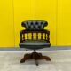 Chesterfield Revolving Captain's Chair with Green Leather Upholstery