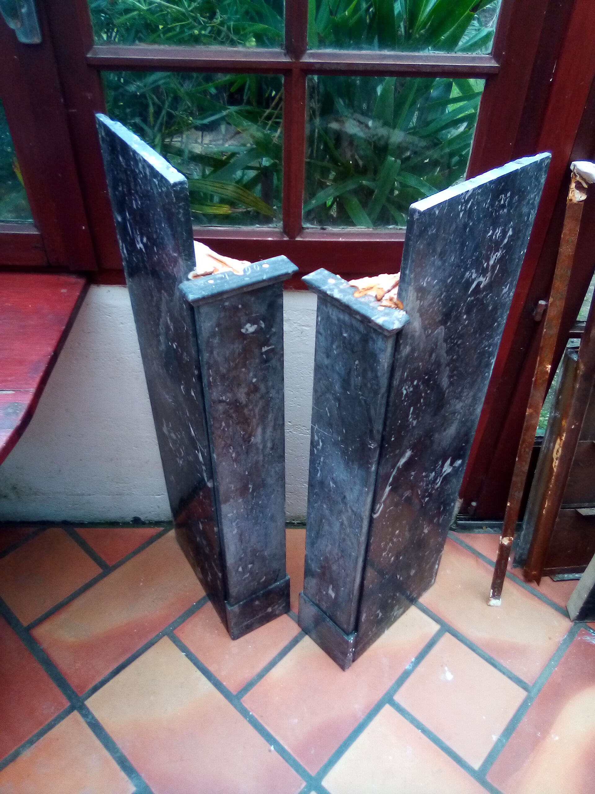 White veined black marble fireplace