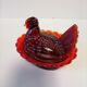 Poule en verre orangé sucrier