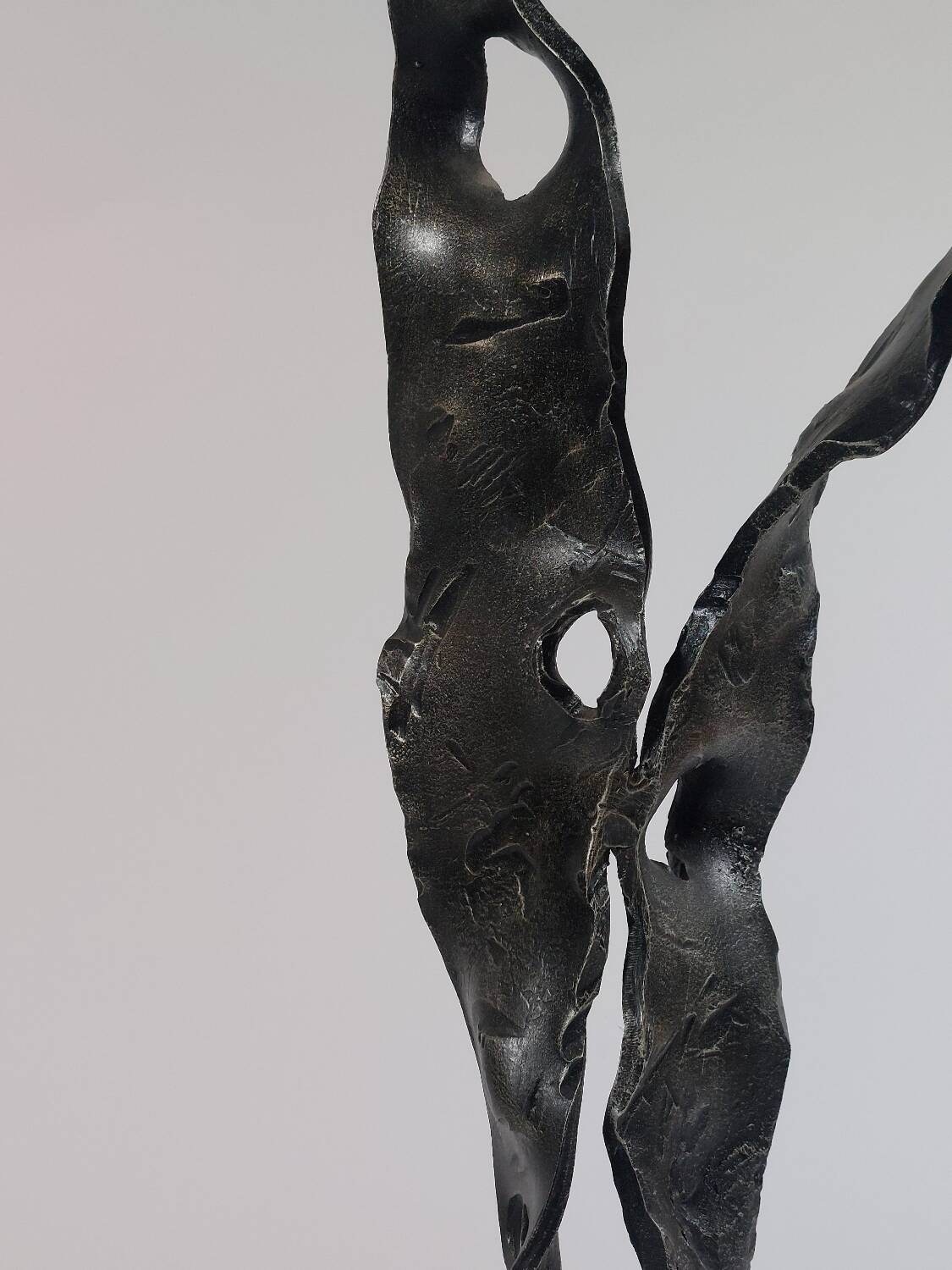 Sculptural brutalist floor candle holder made of hand-forged iron from the 1950s.