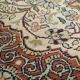 Handmade Persian wool and silk rug