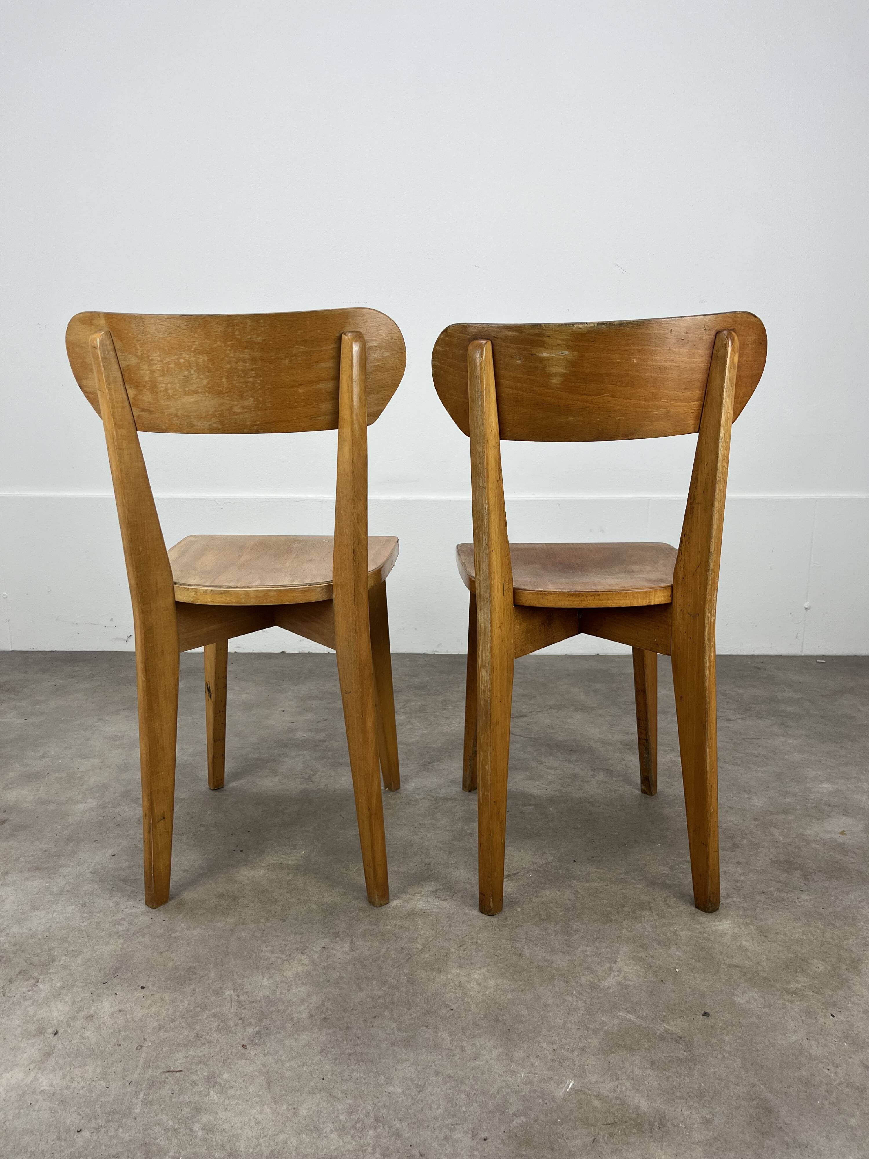 Pair of Luterma bistro chairs, wood, 1950s