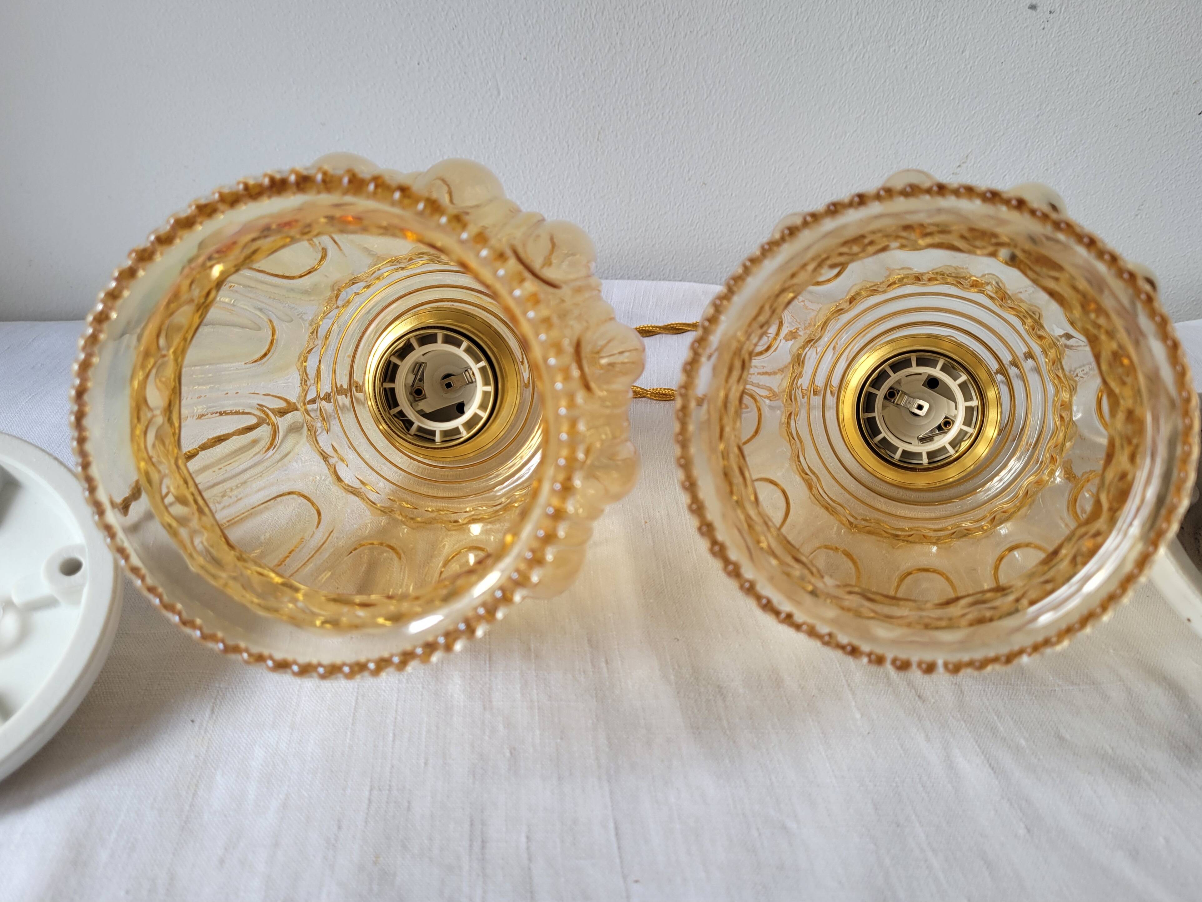 Duo of amber molded glass pendant lights