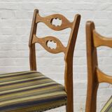 Set of four oak and wool dining room chairs by Henning Kjaernulf, 1960's