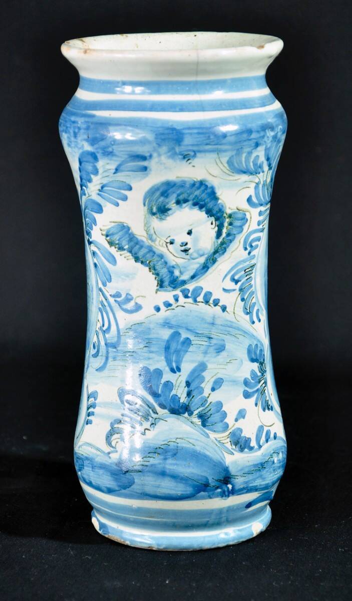 Albarelo in earthenware decorated in blue monochrome with a cherub motif, late 17th century
