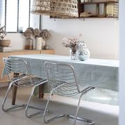 Lot of 2 chrome metal chairs by Gastone Rinaldi.