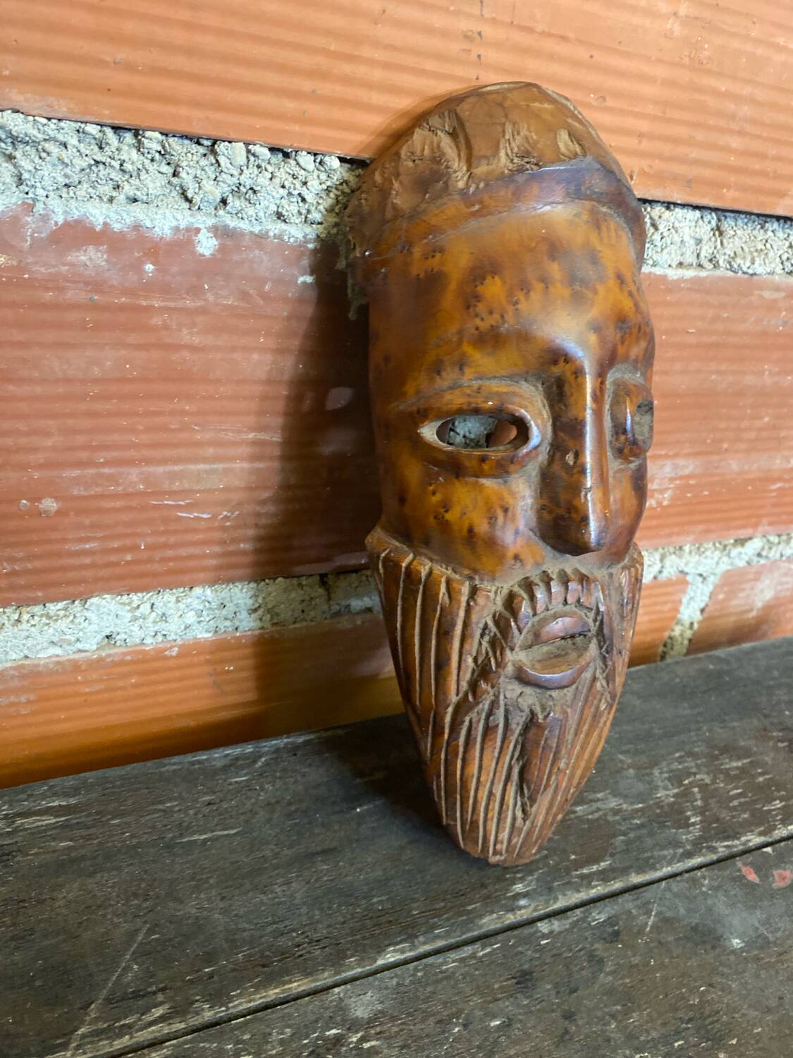 Moroccan mask in carved wood vintage decoration