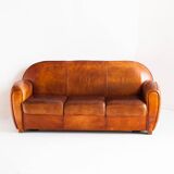 Vintage leather club sofa. Art Deco style. France, 1950s. (sofa convertible into bed)