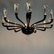 Venetian chandelier in Murano glass in black and colourless, 12 light arms, circa 1990.