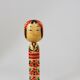 Decorative Kokeshi doll sculpture from northern Japan, hand-painted, signed.
