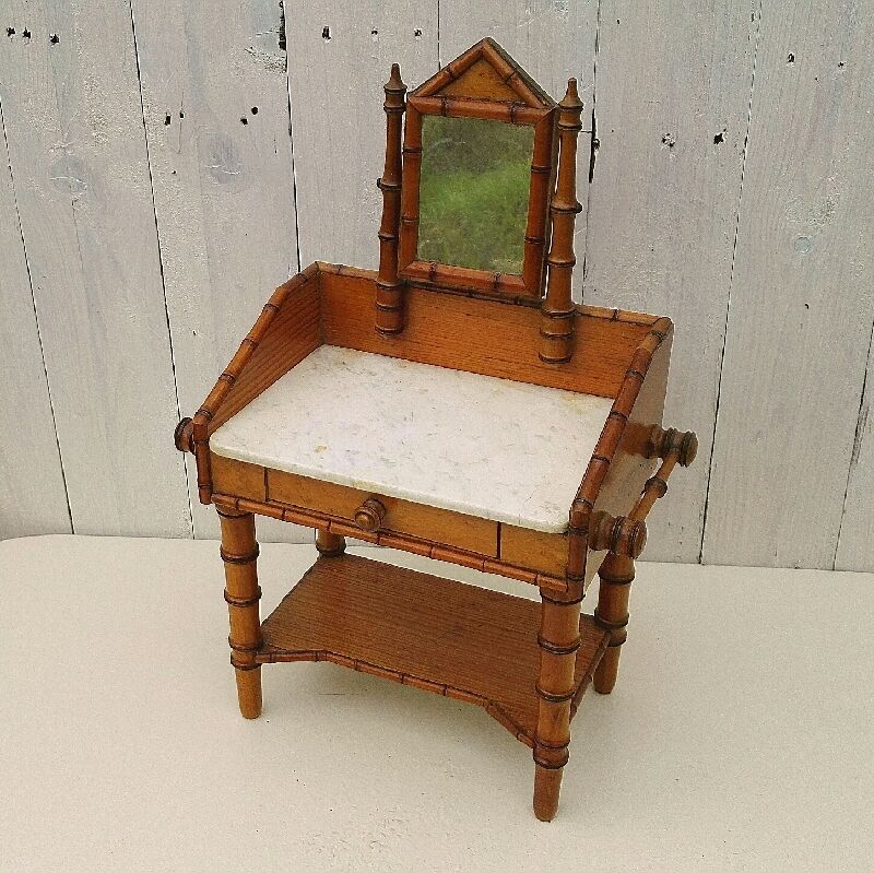 Former vintage bamboo doll hairdresser