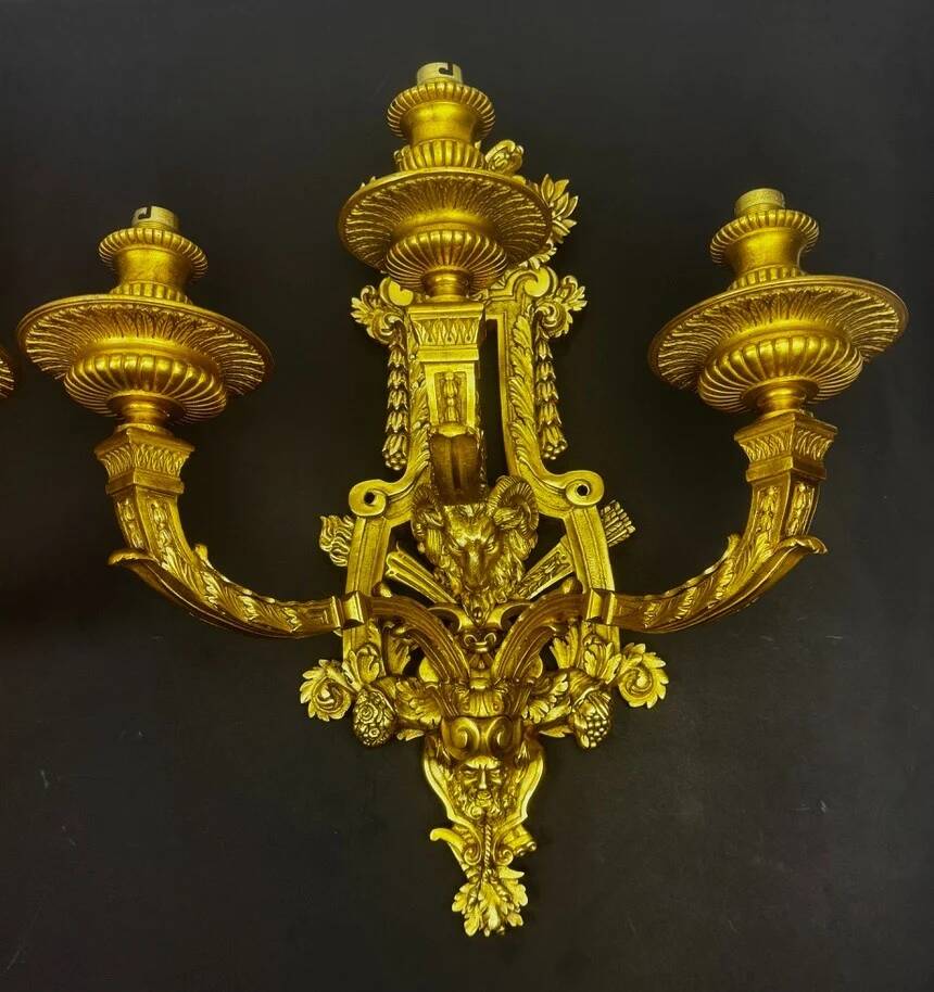A pair of important gilt bronze wall sconces, Louis XVI style, 19th century.