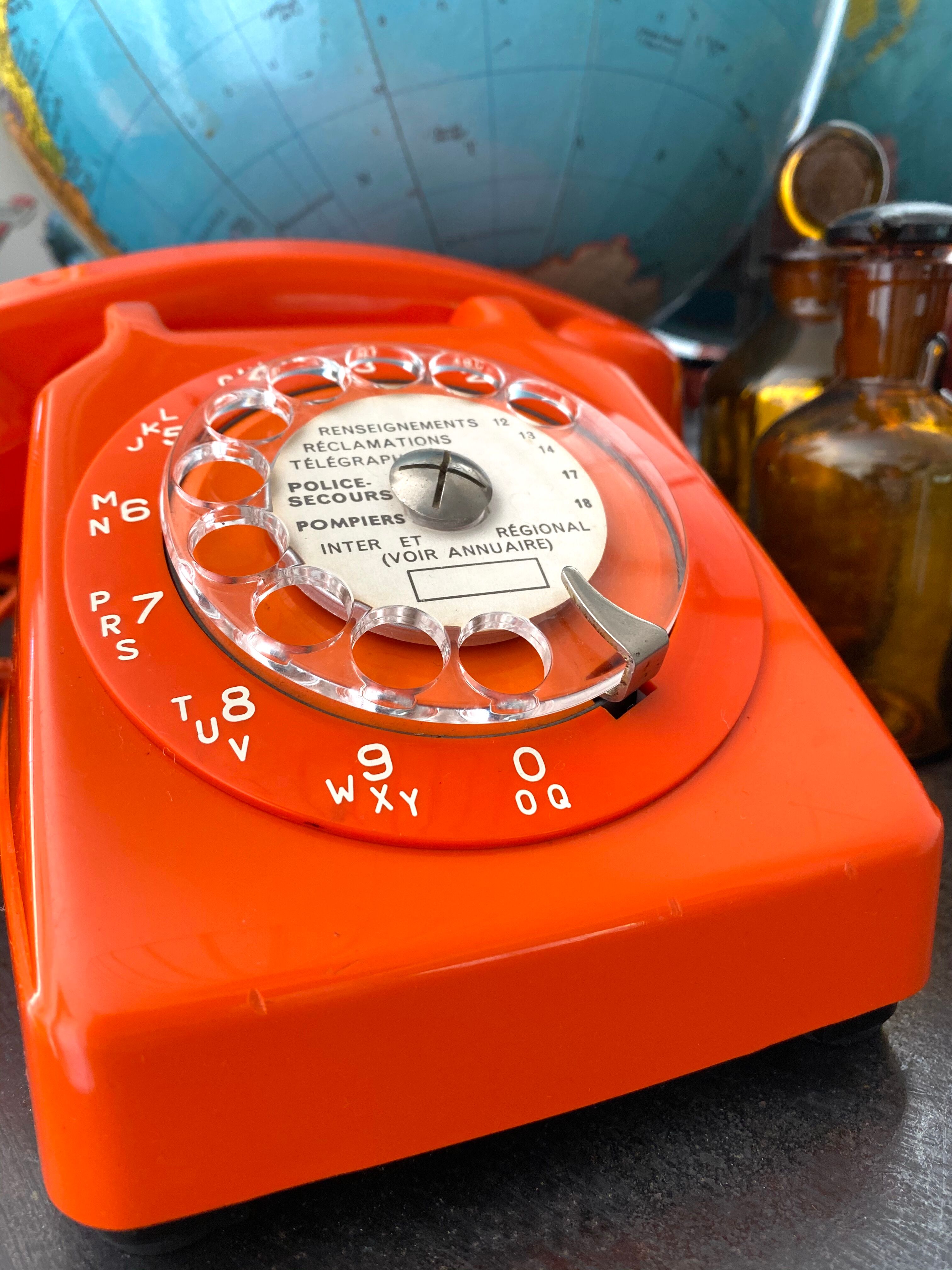 Orange vintage dial phone