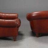 Paire de fauteuils en cuir caramel foncé