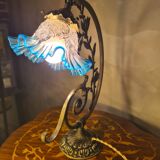 Bronze and brass lamp, transparent and blue glass shade.