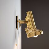 Set of three brass adjustable wall lamps