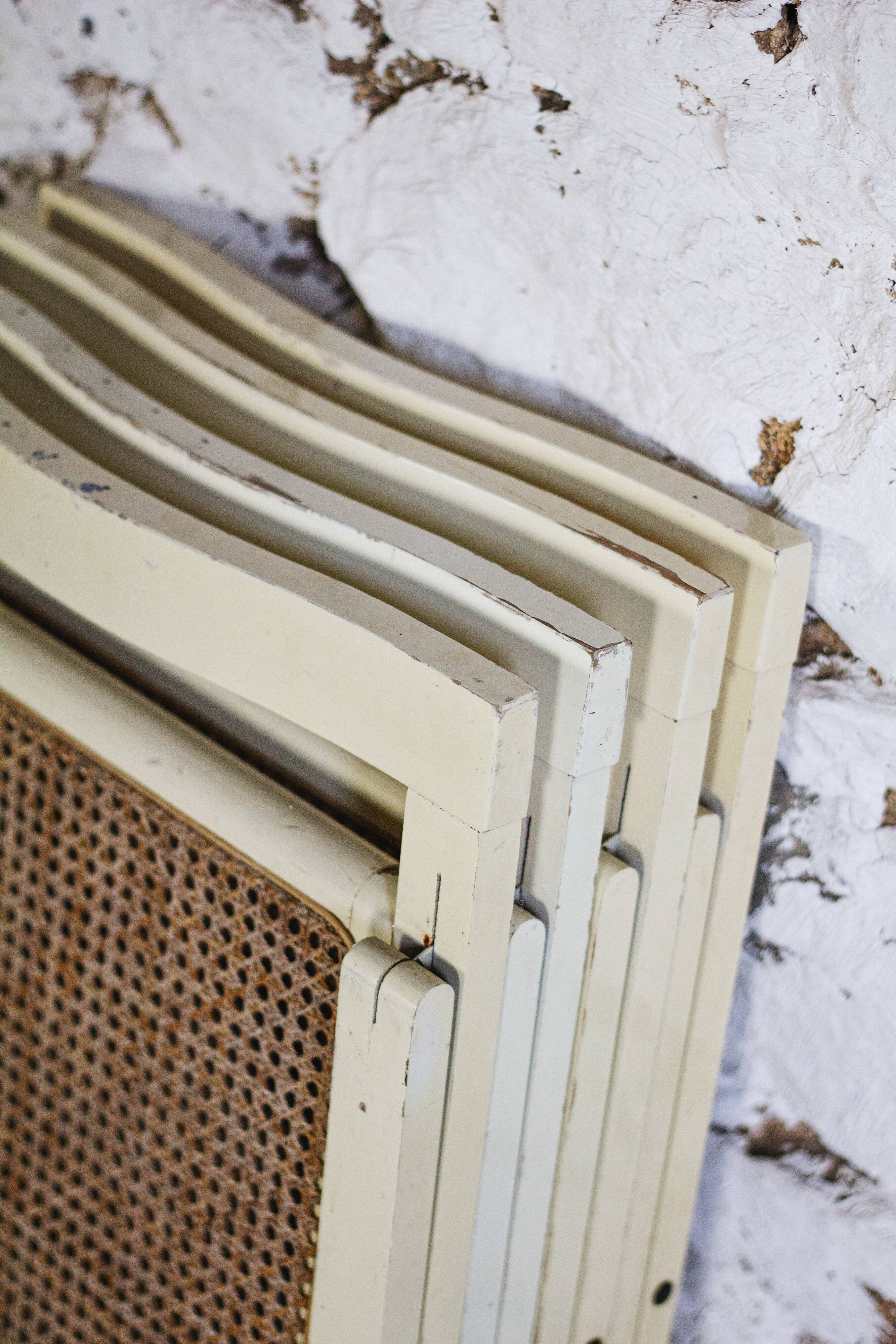 4 vintage folding cane chairs