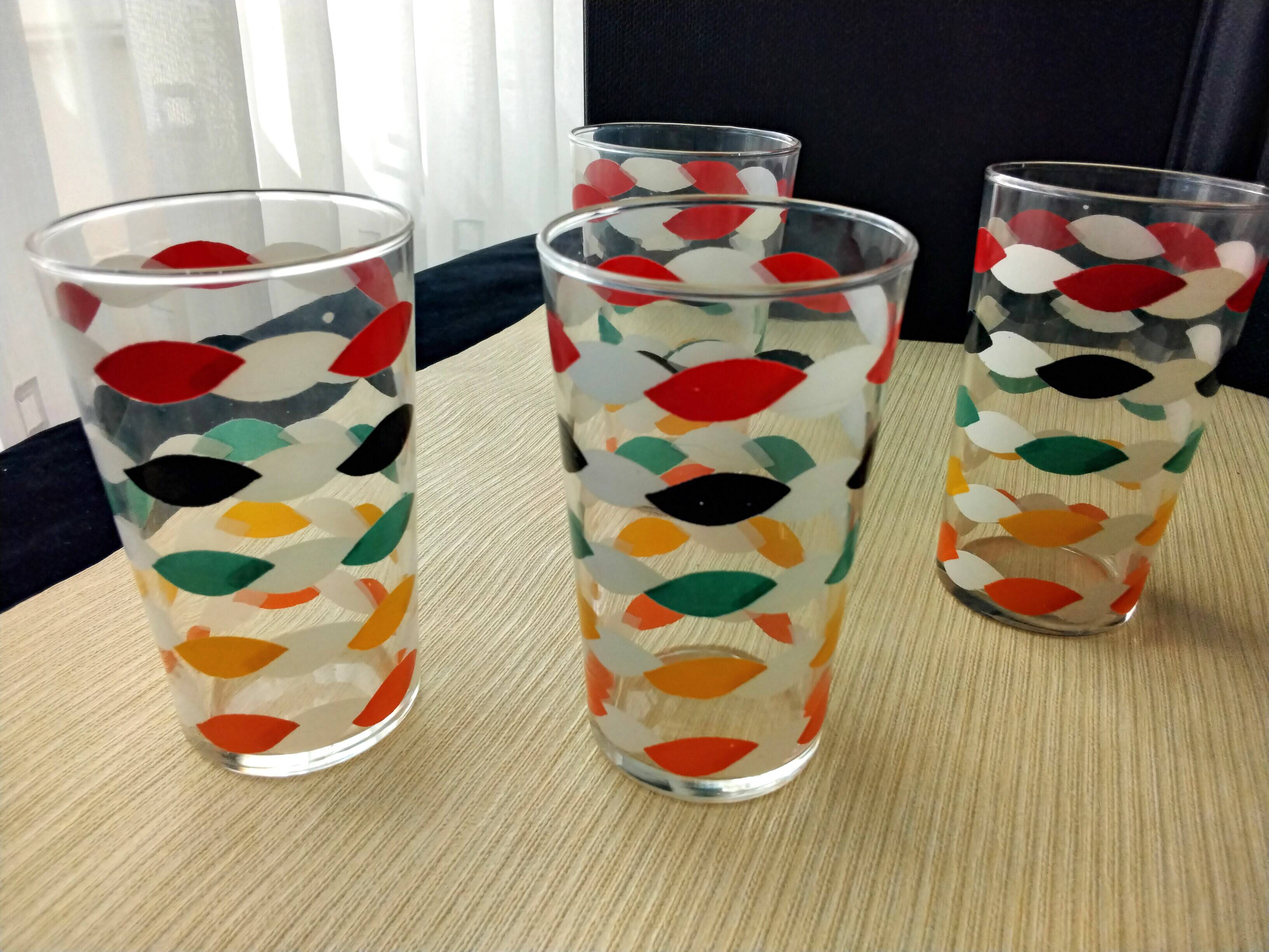 4 Vintage water or orangeade glasses. Screen-printed decoration.