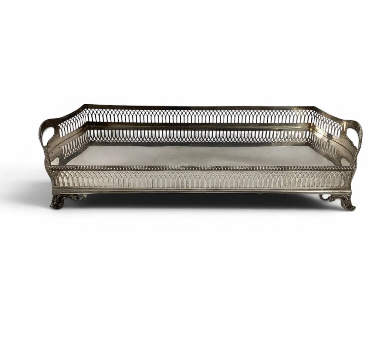 Important silver-plated metal table in the Louis XVI style.